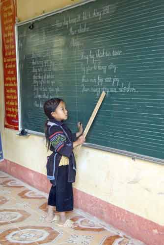 hmong child teaches-AsiaPhotoStock