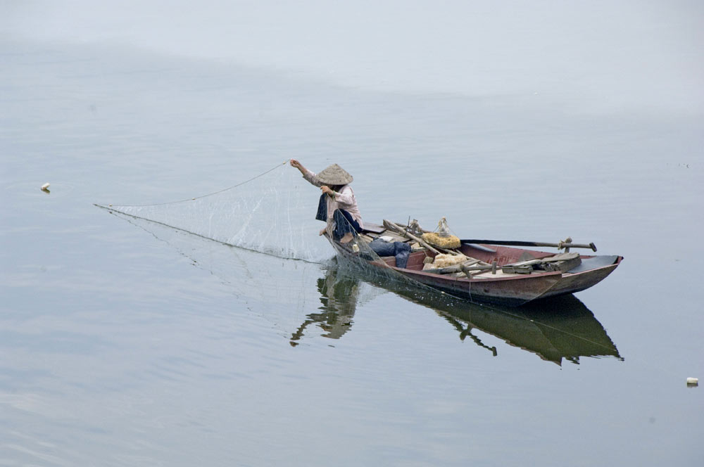 fisherman and net-AsiaPhotoStock