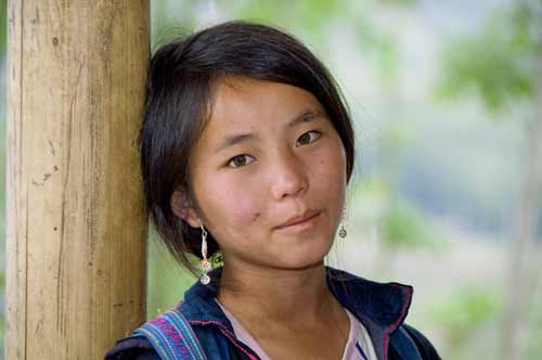 hmong girl relaxes-AsiaPhotoStock
