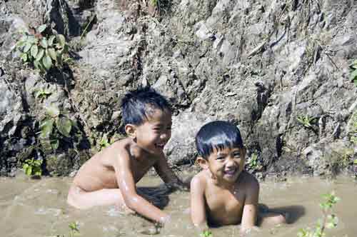 boys bathing-AsiaPhotoStock