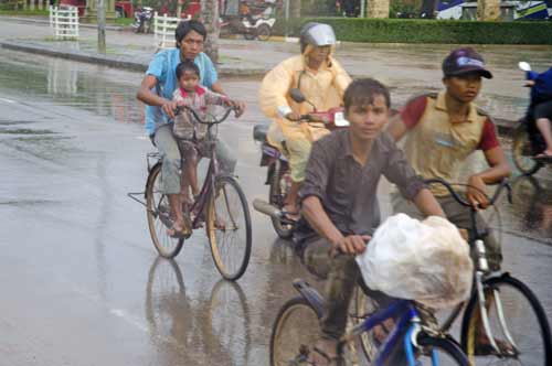 bikes in rain-AsiaPhotoStock