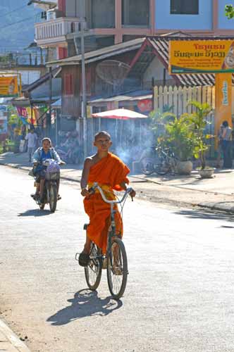 biking monk-AsiaPhotoStock