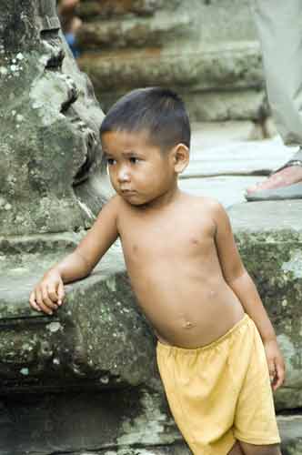 boy at angkor wat-AsiaPhotoStock
