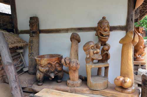 carvings cheeky-AsiaPhotoStock