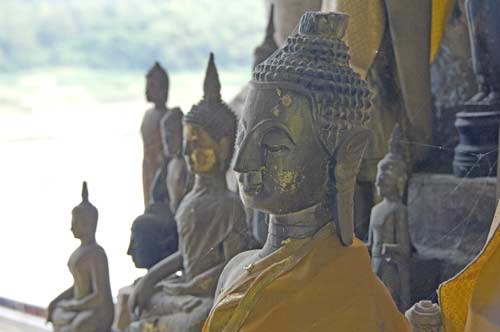 cave buddhas-AsiaPhotoStock