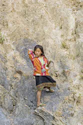 climbing hmong girl-AsiaPhotoStock