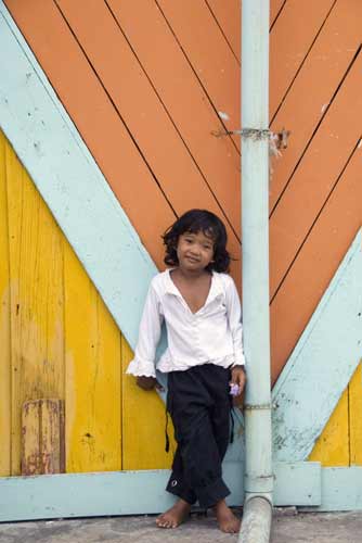 girl and coloured wall-AsiaPhotoStock