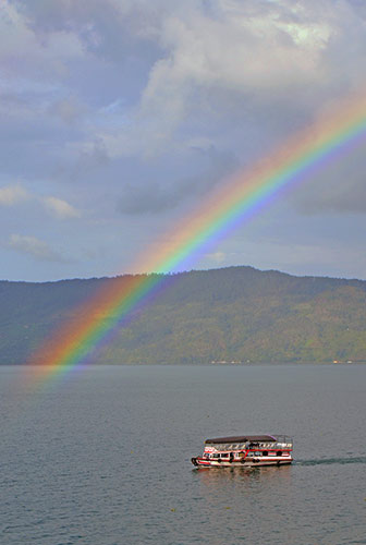 lake toba rainbow-AsiaPhotoStock