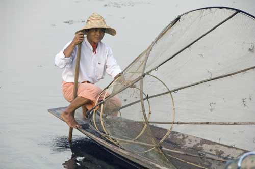 leg rowers fishing-AsiaPhotoStock