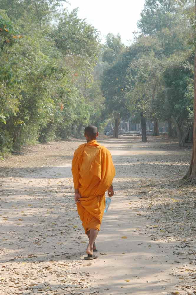 monk walking-AsiaPhotoStock