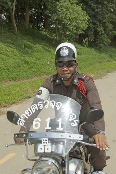policeman on motorbike-AsiaPhotoStock