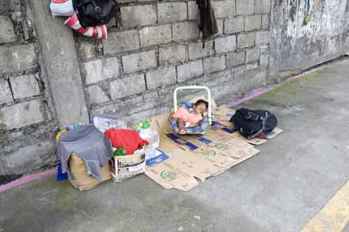 poor child on street-AsiaPhotoStock