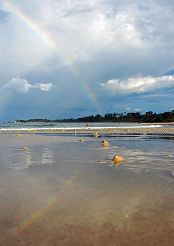 rainbow at beach-AsiaPhotoStock