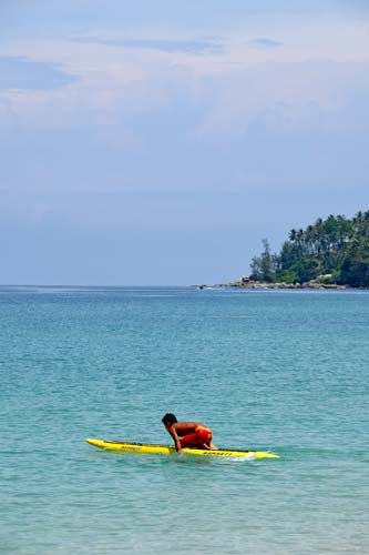lifeguard on surfboard-AsiaPhotoStock