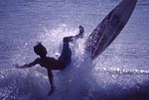 falling off surf board-AsiaPhotoStock