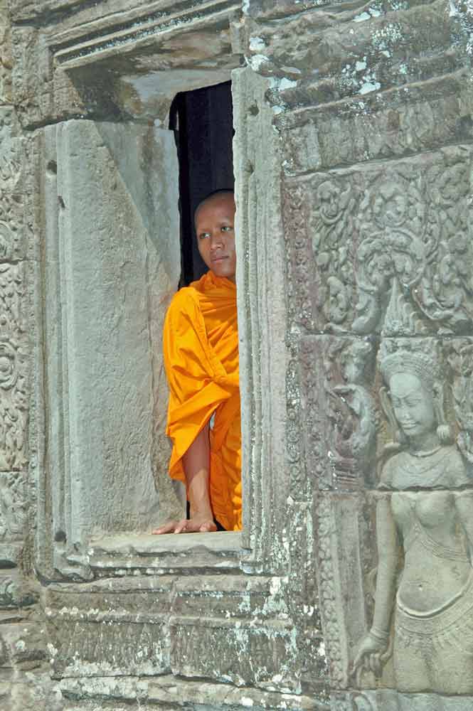 monk at ta prohm-AsiaPhotoStock