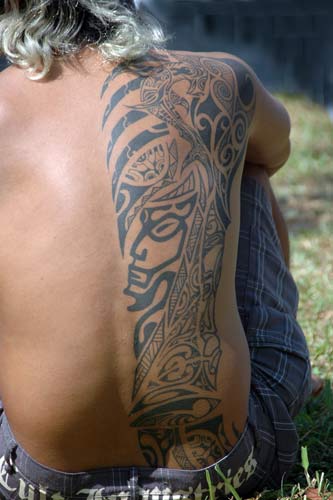 tattoo on back-AsiaPhotoStock