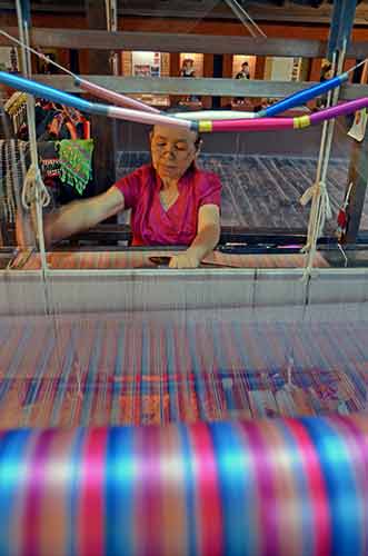 weaving in chiang mai-AsiaPhotoStock